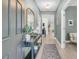 Welcoming entryway featuring stylish decor, a console table, and a decorative mirror at 2809 Conservancy Ln, Charleston, SC 29414