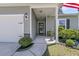 Inviting front porch with craftsman details, stone accents, and lush landscaping at 2809 Conservancy Ln, Charleston, SC 29414