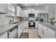 Updated kitchen with granite countertops, stainless appliances, and plenty of cabinet space at 2809 Conservancy Ln, Charleston, SC 29414