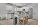 Well-appointed kitchen featuring white cabinetry, stainless steel appliances, and a central island at 2809 Conservancy Ln, Charleston, SC 29414
