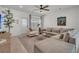 Inviting living room boasting a comfortable sectional sofa, neutral tones, and ample natural light at 2809 Conservancy Ln, Charleston, SC 29414