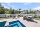 Beautiful backyard with patio, pool, and outdoor dining area, perfect for entertaining guests at 2827 Wagner Way, Mount Pleasant, SC 29466