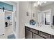 Bathroom featuring a gray vanity, mirror, and a glass door shower at 2827 Wagner Way, Mount Pleasant, SC 29466