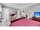 View of a well-lit bedroom with an attached bathroom; featuring carpet flooring and a large bed at 2827 Wagner Way, Mount Pleasant, SC 29466