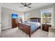 Bright bedroom with neutral walls, plush bed, and large windows offering lots of natural light at 2827 Wagner Way, Mount Pleasant, SC 29466