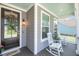 Inviting front porch with rocking chairs and a view of the neighborhood at 2827 Wagner Way, Mount Pleasant, SC 29466