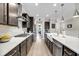 Well-lit kitchen with stainless steel appliances, white countertops, and ample cabinet space at 2827 Wagner Way, Mount Pleasant, SC 29466