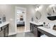 Bright main bathroom with dual vanities, decorative mirrors, and view to the bedroom at 2827 Wagner Way, Mount Pleasant, SC 29466