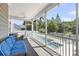 Relaxing screened porch overlooking a backyard pool and lush greenery at 2827 Wagner Way, Mount Pleasant, SC 29466