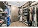 A spacious walk-in closet with custom wood shelving and ample storage for clothes, shoes, and accessories at 2827 Wagner Way, Mount Pleasant, SC 29466