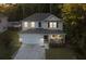 Charming two-story home with a well-maintained lawn and attached two-car garage at 314 Beverly Dr, Ladson, SC 29456