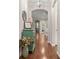 Welcoming hallway with hardwood floors, elegant décor, and an arched doorway at 314 Beverly Dr, Ladson, SC 29456