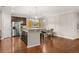 Elegant kitchen with a center island, stainless steel appliances, and hardwood flooring at 314 Beverly Dr, Ladson, SC 29456
