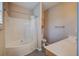 This bathroom offers a tub and shower combo with neutral walls and gray flooring at 317 Pimpernel St, Summerville, SC 29483