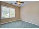 Bright bedroom with window and blind shades, neutral walls, and soft carpet flooring at 317 Pimpernel St, Summerville, SC 29483