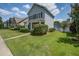 Charming two-story home with a well-manicured lawn and inviting front porch in a suburban neighborhood at 317 Pimpernel St, Summerville, SC 29483