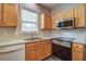 Bright kitchen area featuring wood cabinets, stainless steel appliances, and plenty of counter space at 317 Pimpernel St, Summerville, SC 29483