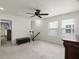 Bright bonus room with natural light, a ceiling fan, and a convenient storage bench at 3191 Moonlight Dr, Charleston, SC 29414