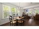 Bright and spacious dining area offering lots of natural light, connecting to living area at 3191 Moonlight Dr, Charleston, SC 29414