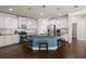 Kitchen with a large island and pendant lighting providing ample workspace for cooking and entertaining at 3191 Moonlight Dr, Charleston, SC 29414