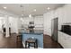 Open kitchen offering stainless steel appliances, a large island, and great natural light at 3191 Moonlight Dr, Charleston, SC 29414
