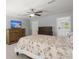 Spacious bedroom featuring a dresser and an open doorway to the ensuite bathroom at 3191 Moonlight Dr, Charleston, SC 29414