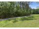 Tree-lined path winding through a verdant green space at 3191 Moonlight Dr, Charleston, SC 29414