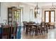 Cozy dining room area adjacent to the kitchen with wooden furniture and natural light at 3301 Palm Blvd, Isle of Palms, SC 29451