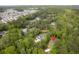 Aerial view shows the home nestled in a mature community with lush trees in a quiet neighborhood at 3361 Olivia Marie Ln, Johns Island, SC 29455