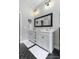 Bathroom features double vanity, tile floors, and modern fixtures at 3361 Olivia Marie Ln, Johns Island, SC 29455