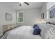 Bright bedroom featuring white walls, natural light, carpet, and stylish decor at 3361 Olivia Marie Ln, Johns Island, SC 29455