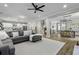 Bright, open floor plan with a spacious living room that flows into the kitchen and dining areas at 3361 Olivia Marie Ln, Johns Island, SC 29455