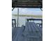 Dock with picnic table, seating and a sink at 3807 Scott Creek Dr, Edisto Island, SC 29438