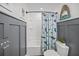 bathroom with shower/tub, and shark themed shower curtain and wall decor at 401 Carrara Dr, Summerville, SC 29486