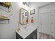 Charming half bathroom with decorative mirror and fixtures, adding style to a functional space at 401 Carrara Dr, Summerville, SC 29486