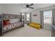 Charming ' bedroom with a bunk bed, yellow sofa and bright natural light at 401 Carrara Dr, Summerville, SC 29486