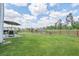 Spacious backyard with a patio set and play area, perfect for outdoor entertaining at 4024 Exploration Rd, Ladson, SC 29456