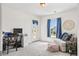 Bright and airy office featuring modern furniture, a door to the patio, and a beautiful view from the window at 4024 Exploration Rd, Ladson, SC 29456