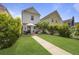 Charming backyard with manicured lawn, patio area, perfect for outdoor relaxation and entertaining at 404 Forsythia Ave, Summerville, SC 29483