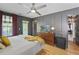 Bedroom with a ceiling fan, a TV and access to an ensuite bathroom at 404 Forsythia Ave, Summerville, SC 29483