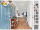 Bright and inviting foyer showcasing a hardwood floor, decorative console table, and views into the living spaces at 408 Trevi Ln, Summerville, SC 29486