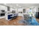 Modern kitchen featuring white cabinets, a center island with seating, and stainless steel appliances at 408 Trevi Ln, Summerville, SC 29486