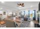 Open-concept living room with a view of the dining area and kitchen, showcasing a comfortable seating arrangement at 408 Trevi Ln, Summerville, SC 29486