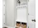 Mudroom featuring a built-in bench with storage, and hooks for coats and bags at 408 Trevi Ln, Summerville, SC 29486