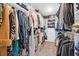 Organized walk-in closet features custom shelving to provide ample storage space for clothes and accessories at 408 Trevi Ln, Summerville, SC 29486