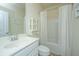 Bathroom with white vanity, decorative art, and shower-tub combination with a fresh white curtain at 409 Carousel Ct, Summerville, SC 29483