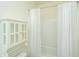Well-maintained bathroom featuring a vanity and a shower-tub combination with a white shower curtain at 409 Carousel Ct, Summerville, SC 29483