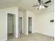 Bedroom featuring carpeted floors, a ceiling fan, and ensuite doors to the bathroom and closet at 409 Carousel Ct, Summerville, SC 29483