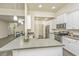 Spacious kitchen boasting ample counter space, stainless steel appliances, and an open layout with views of the living area at 409 Carousel Ct, Summerville, SC 29483