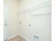 Laundry room with utility connections, door to outside, and storage shelving ready for appliances at 409 Carousel Ct, Summerville, SC 29483